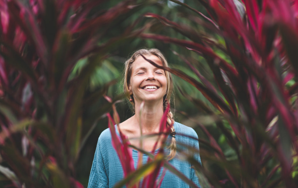 Portrait of beautiful woman in rainforest