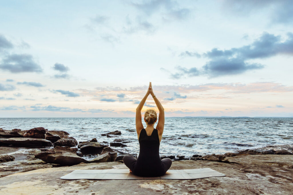 Ayurveda and yoga practice on the beach