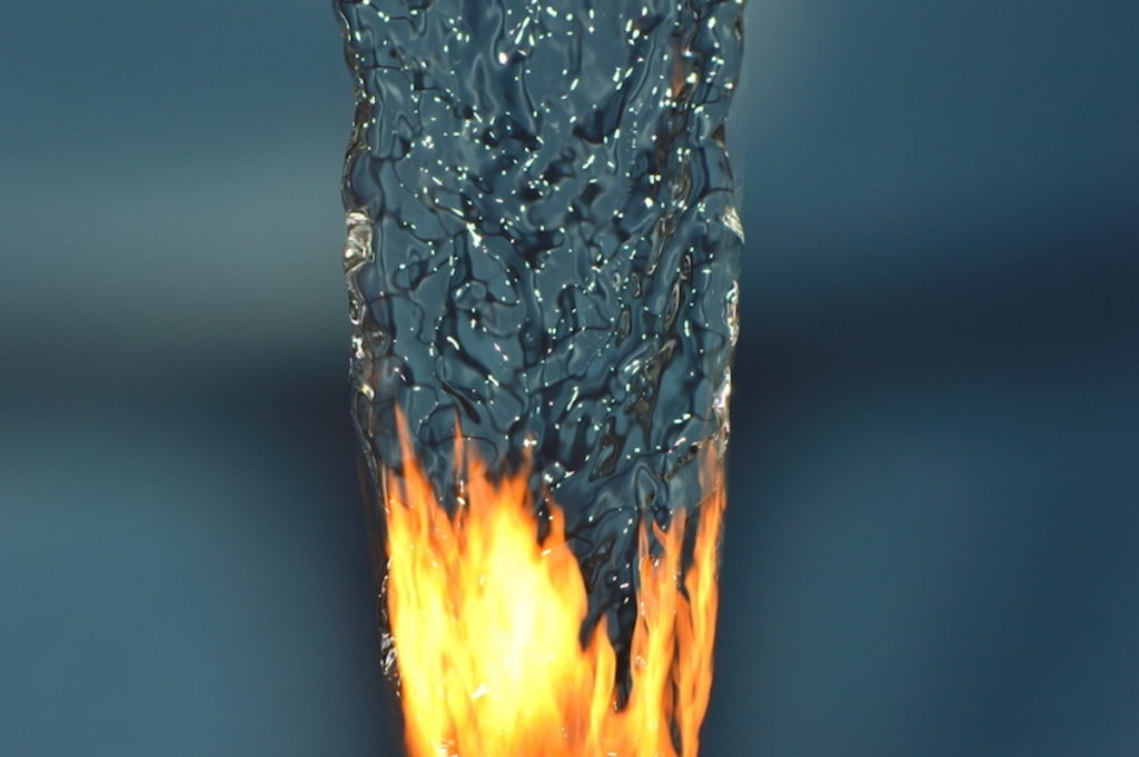 A stream of water turning into a flame
